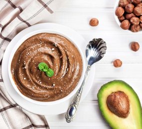 Vegan chocolate pudding, avocado and nuts.