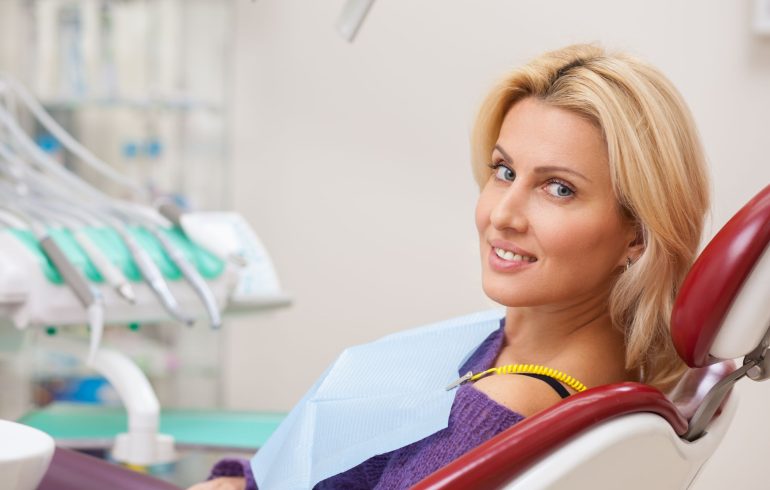 Relaxed woman in a dental chair before dental treatment.