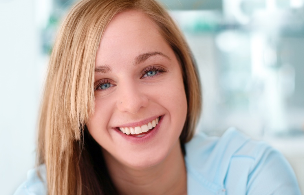 happy smiling girl with blue background